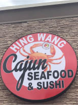 hing wang cajun seafood & sushi logo